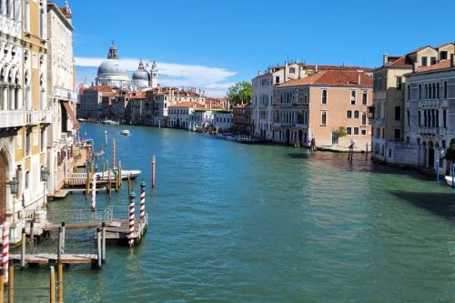 Gondolas on a canal in Venice, Italy