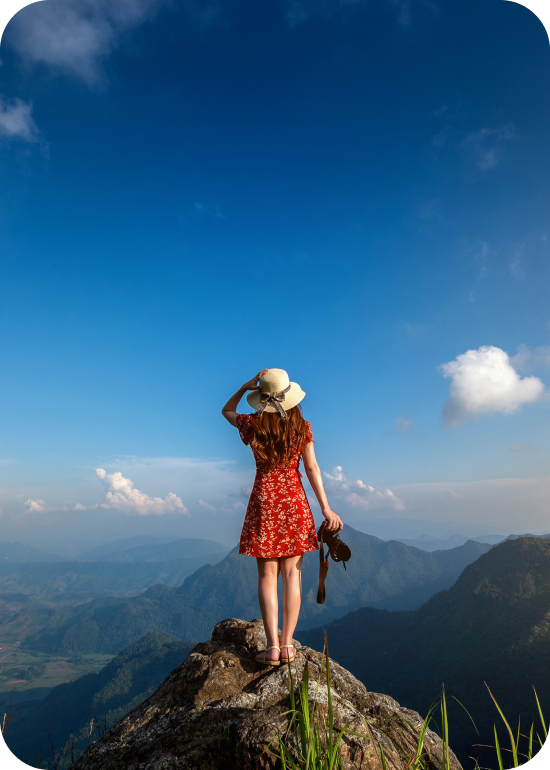 photo of a woman hiking in the mountains